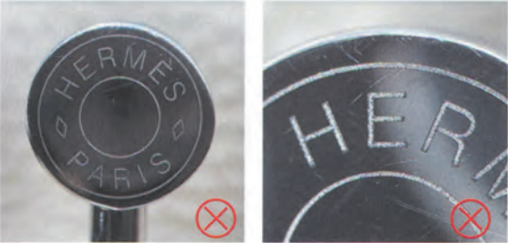 Hermes Kelly Bag Replica-Counterfeit metal engraving on fake Hermès Kelly bag hardware, with shallow and uneven "Hermès Paris" lettering.