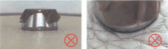 Hermes Kelly Bag Replica-Counterfeit bottom studs on fake Hermès Kelly bag, featuring flat caps and loose attachment with red X marks.