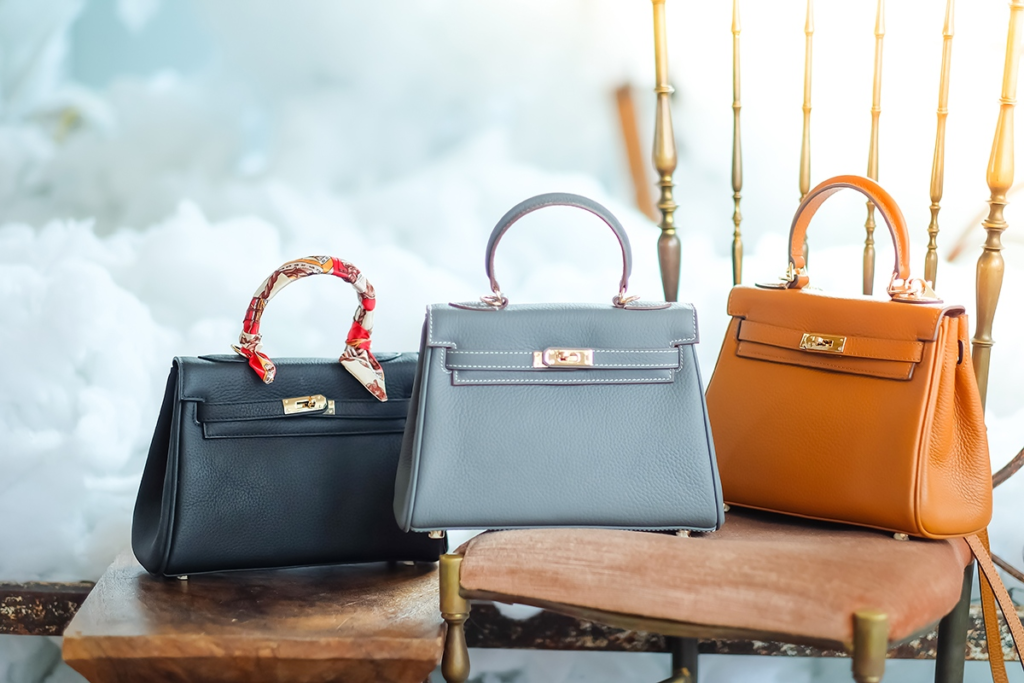 Three Hermès Kelly Bags in Different Colors and Materials - Showing Versatility of the Timeless Collection