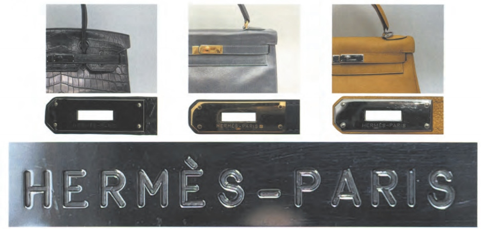 Hermès Birkin hardware showing "HERMES-PARIS" engraving – classic metal stamp detail.