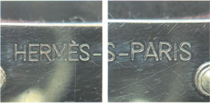 Hermès Birkin bag hardware with "HERMES-S-PARIS" engraving – close-up of authentic metal lettering.