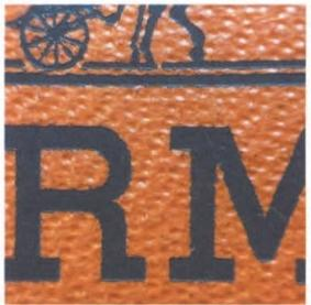 Partial view of Hermès bag with "RM" marking – internal craft code.