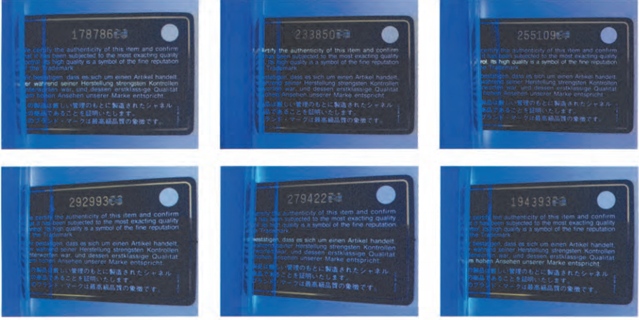 Authentic Chanel hologram laser tag illuminated under a UV fluorescent light, revealing the hidden red line used by experts for authentication.