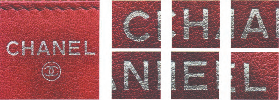 Authentic Chanel silver foil stamping on leather, displaying specific letter geometry like the flat-topped 'A' and shortened top 'H' crossbar.