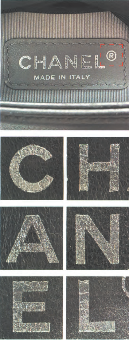 Authentic Chanel Le Boy interior silver foil stamp label showing precise letter thickness and high-quality leather grain.