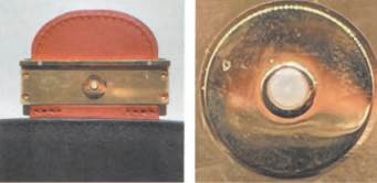 Authentic Louis Vuitton lock clasp snap button, showing polished metal finish and internal mechanism