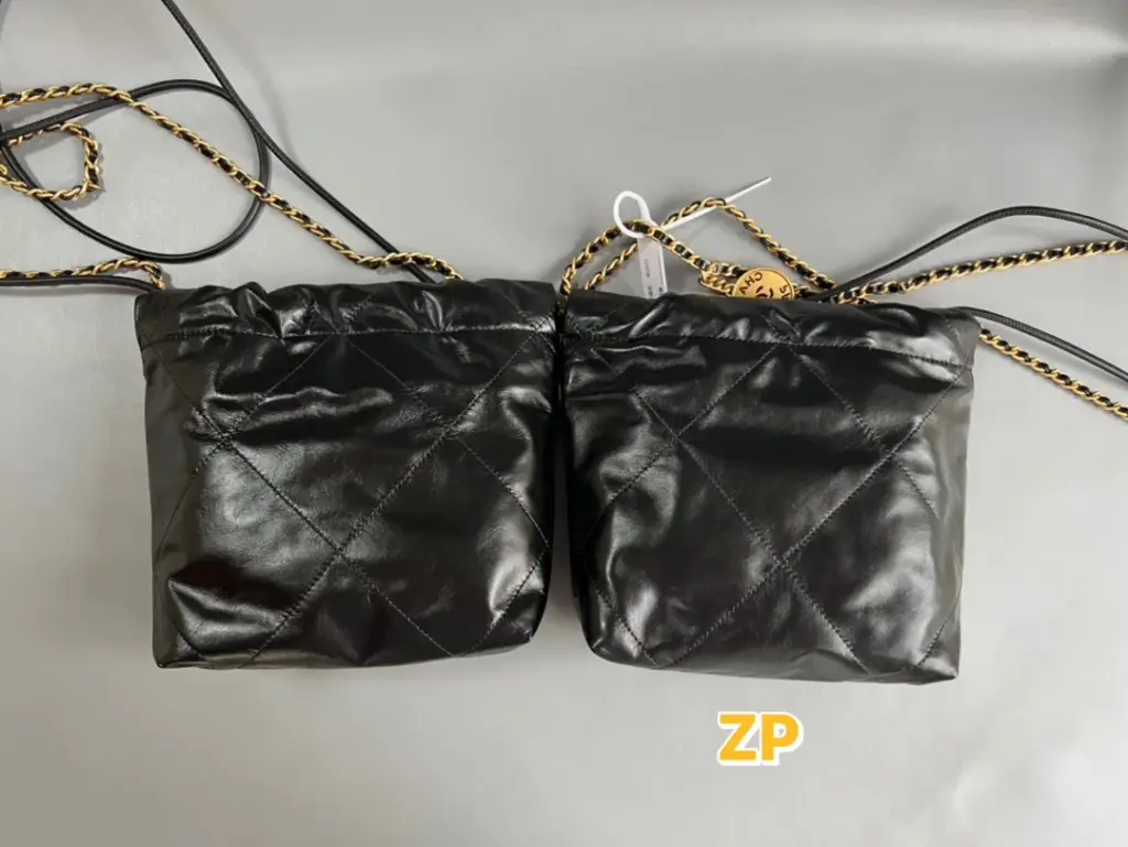 Authentic reference and reviewed black Chanel 22 Mini-style bag from the rear