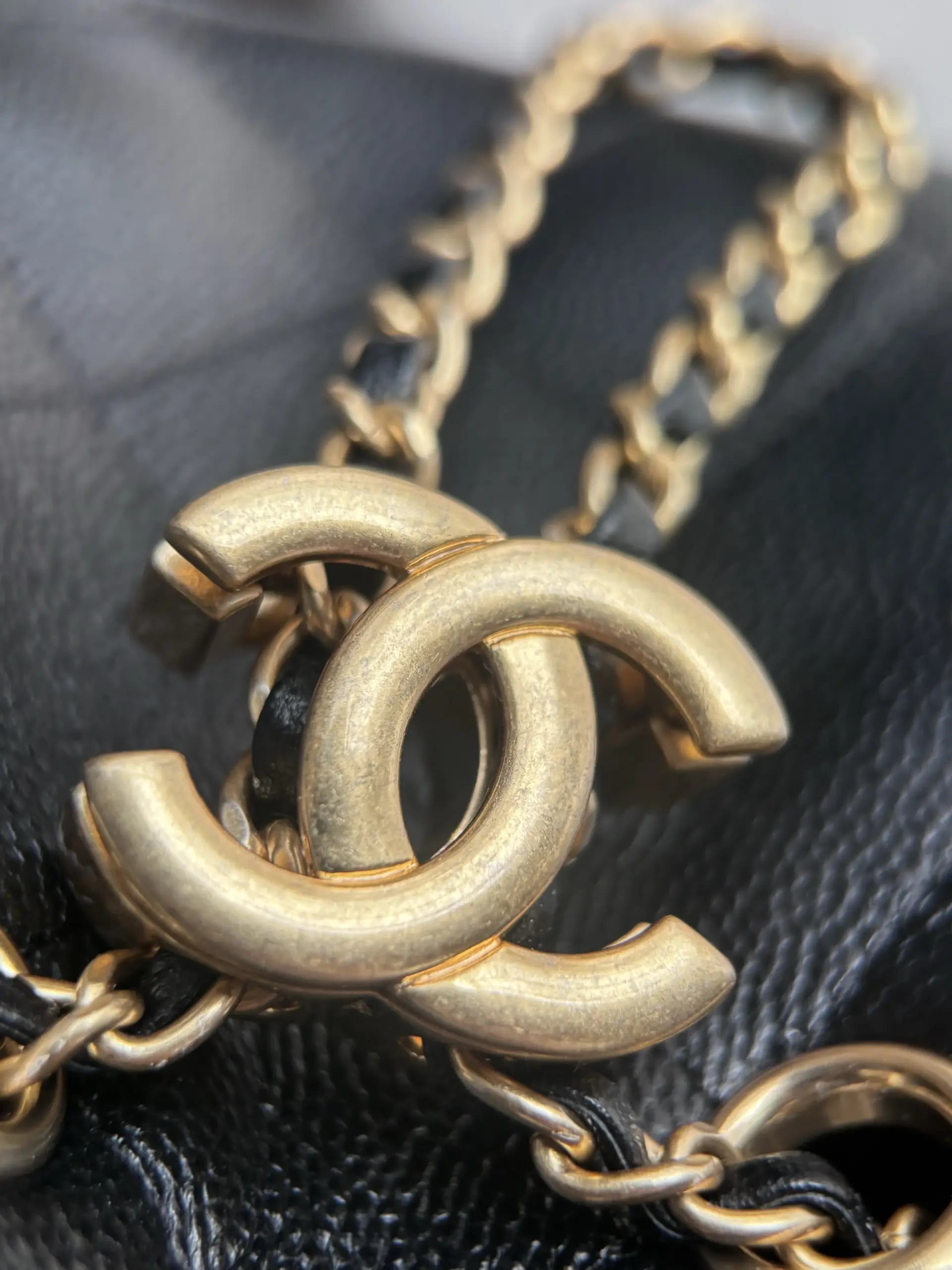 Chanel 25 Mini black gold double-C drawstring charm macro