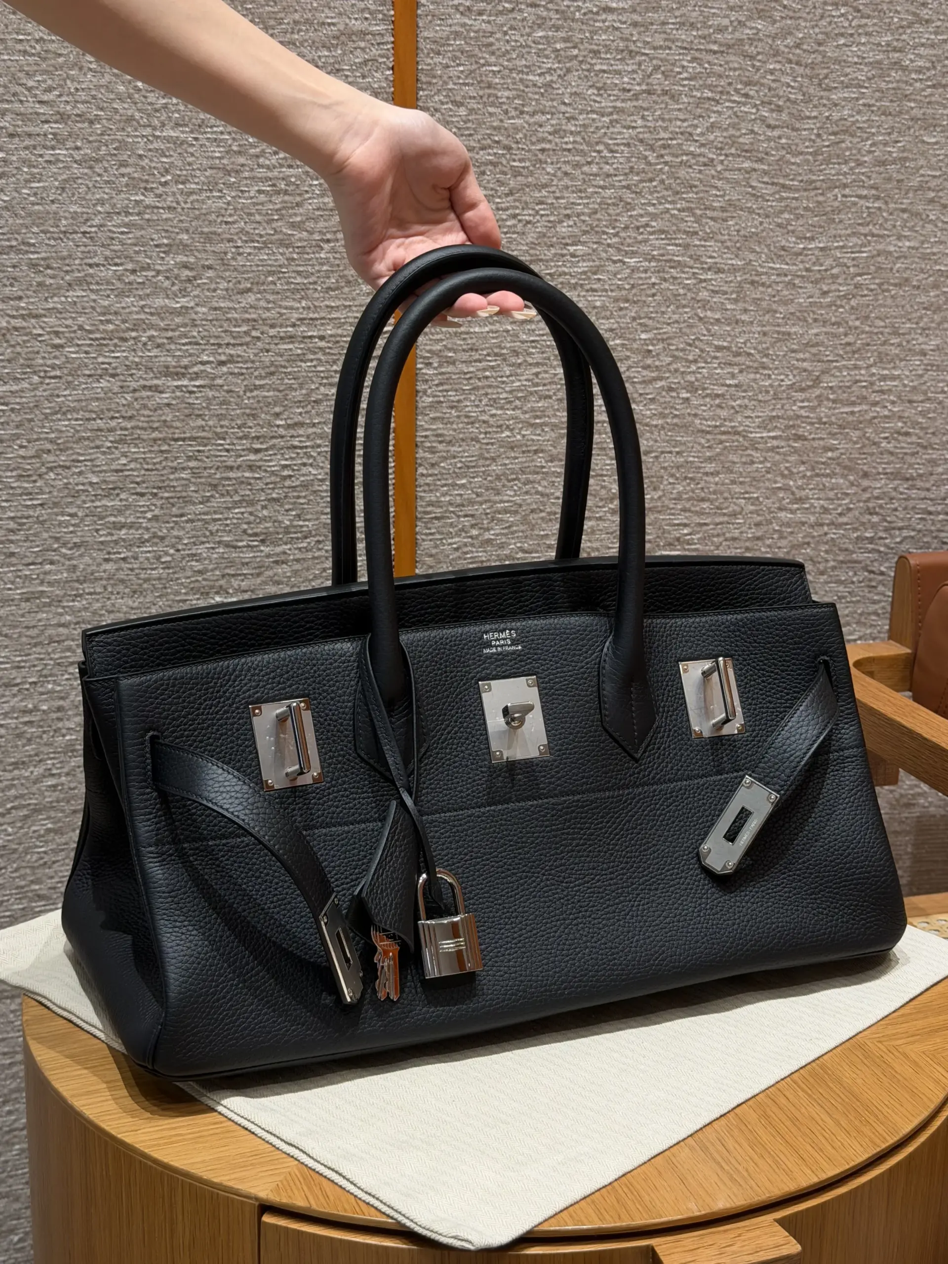 Open front view of a black Shoulder Birkin 42 replica showing the silver-tone hardware layout