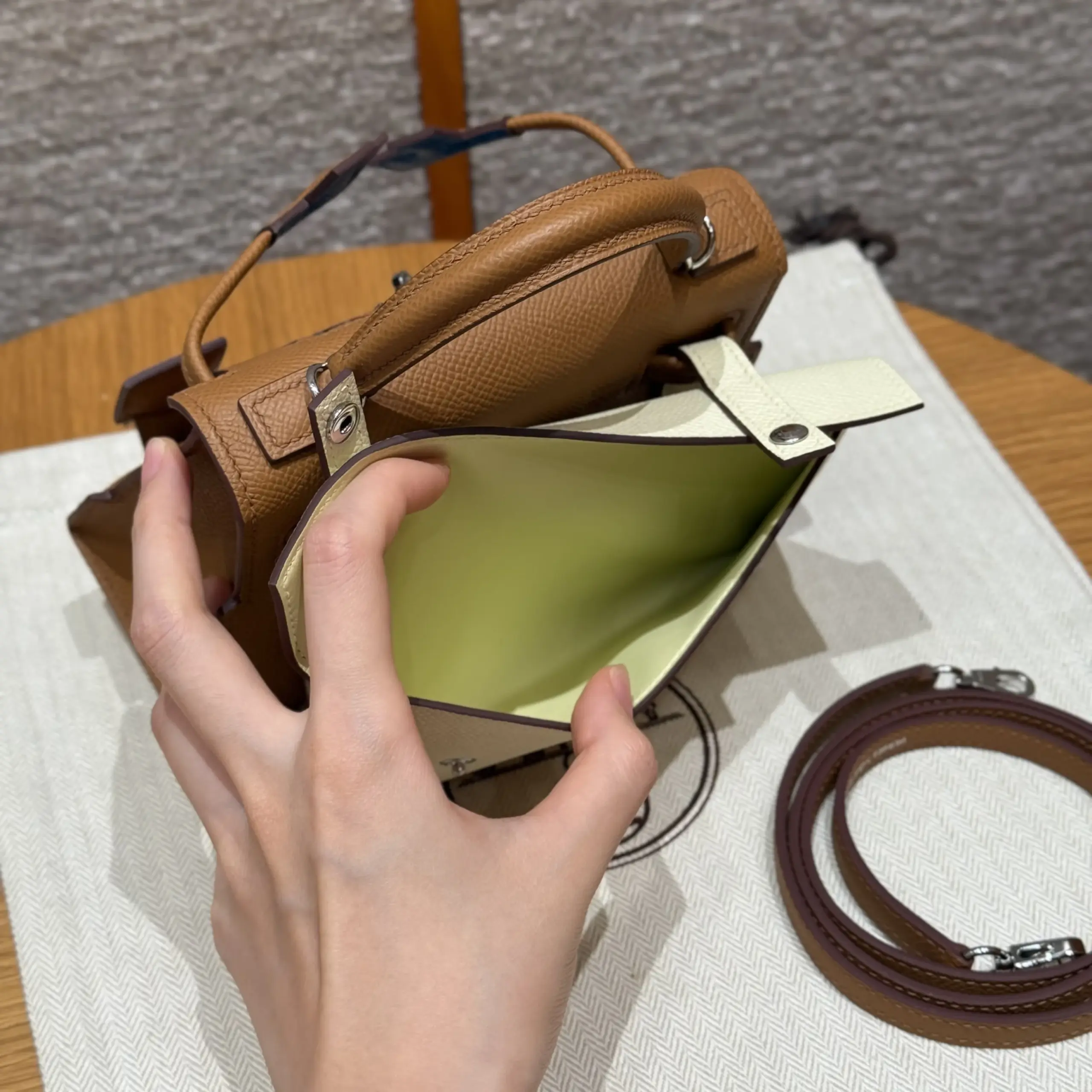 Open view of the pale pouch and its narrow interior