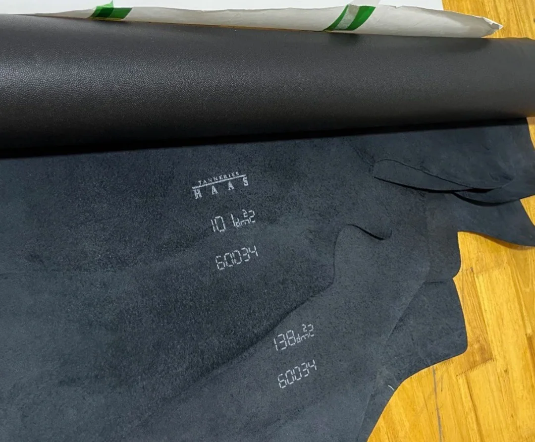 HAAS-stamped black hide from Cyan's cutting-stage material record