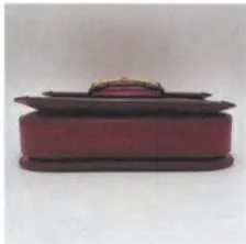 Base view of a Gucci bag showing the bottom panel and surrounding leather edges