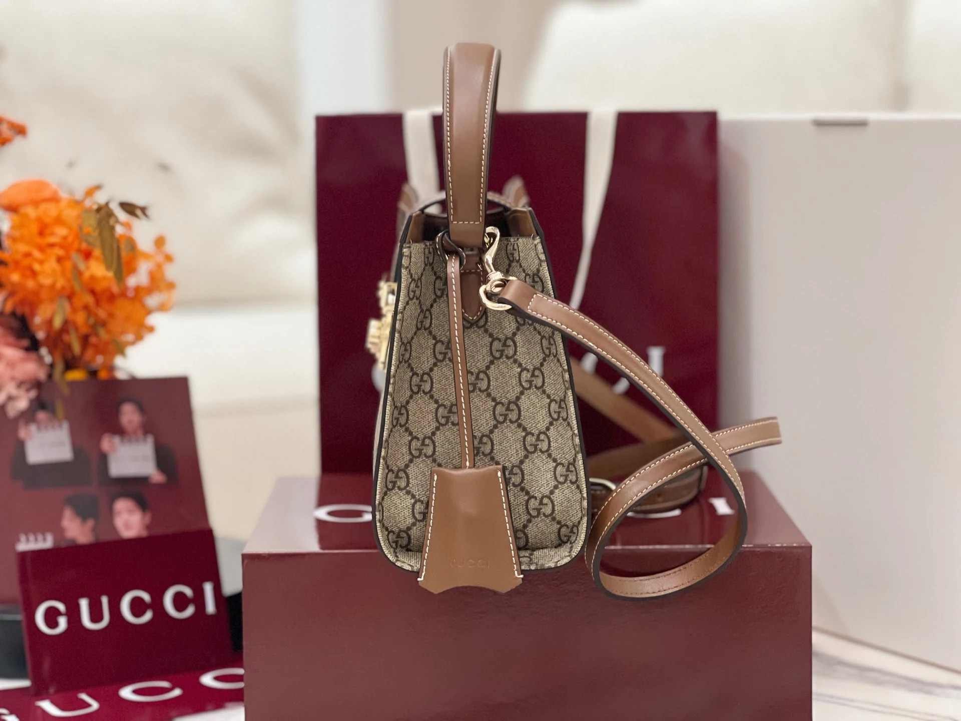 Gucci Padlock side profile with a separate shoulder-strap clip